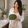 Woman Holding The Green Soft Leather Toiletry Case