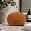 Vera Soft Leather Toiletry Case from, made of matte full-grain, hand-stained vegetable-tanned leather.