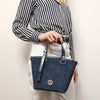 Woman Posing With The Dark Blue Suede Leather Handbag