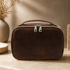 Toiletry Bag made of premium leather with antique brass zipper, perfect for organizing essentials.