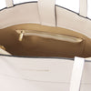 Internal Zip Pocket View Of The Beige Tote Bag