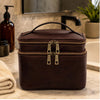 Travel Toiletry Bag crafted in full grained leather with dual zipped closures, perfect for organizing grooming essentials.