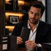 Man examining an Exclusive Vertical Bifold Wallet made from Premium Italian Leather, showcasing card slots and I.D window.