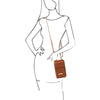 Crossbody View Of The Woman Posing With The Cognac Wallet And Phone Holder