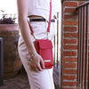 Woman Posing With The Lipstick Red Wallet And Phone Holder