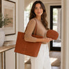 Woman With The Brown Leather Shoulder bag and Soft Leather Toiletry Case