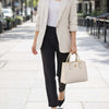 Woman Holding The Beige Womens Leather Tote