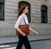 Woming Posing With The Brown Women's Business Bag
