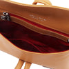 Internal Zip Pocket View Of The Cognac Womens Leather Clutch
