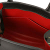 Womens Leather Handbag and Toiletry Case Set interior view showing spacious red lining and organized pockets.