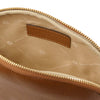 Interior view of a Leather Backpack and Toiletry Bag Set, showcasing premium pebbled leather lining and zipper details.