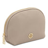 Leather Backpack and Toiletry Bag Set - Soft leather toiletry pouch in beige with gold zipper and logo.