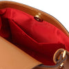 Interior view of Womens Leather Tote Bag featuring spacious pockets and red lining for easy organization.