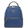 Leather Backpack and Toiletry Bag Set featuring a stylish denim pebbled leather backpack with gold accents.