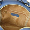 Inside view of the Leather backpack featuring organization pockets, part of the Leather Backpack and Toiletry Bag Set.