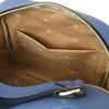 Interior view of the Leather Backpack and Toiletry Bag Set showing the spacious compartment and pockets.