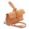 Womens Leather Clutch in warm apricot color, stylish design with adjustable strap and unique knot handle.