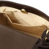 Inside view of coffee Womens Leather Tote Bag featuring cream lining and pocket.