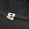 Close-up of clasp on Womens Leather Shopper Bag showcasing gold hardware and pebbled texture.