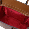Interior view of Womens Leather Shopper Bag showcasing spacious compartment and red lining.