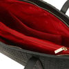 Interior view of a Woven Leather Shopping Bag showing red lining and multiple compartments for organization.
