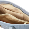 Interior view of Woven Leather Shopping Bag showcasing pockets and zipper compartment.