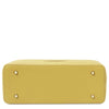 Bottom view of Woven Leather Shopping Bag showcasing its pastel yellow woven texture and sturdy base. Woven Leather Shoulder Bag.