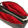 Interior view of Woven Leather Shoulder Bag showcasing black woven leather and vibrant red lining with multiple compartments.