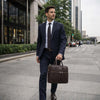 Man Carrying The Dark Brown Business Laptop Bag