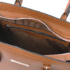 Internal Zip Pocket View Of The Cognac Genuine Leather Handbag