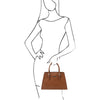 Woman Posing With The Cognac Genuine Leather Handbag