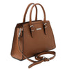 Angled And Shoulder Strap View Of The Cognac Genuine Leather Handbag