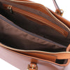 Internal Zip Pocket View Of The Cognac Ruga Handbag