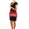 Women Posing With The Red Aura Ruga Handbag