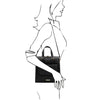 Over The Shoulder View Of Woman Posing With The Black Backpack Handbag