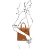 Over The Shoulder View Of Woman Posing With The Cognac Backpack Handbag