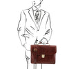 Man Posing With The Brown Leather Laptop Briefcase Of The 4 Wheeled Luggage And Leather Laptop Briefcase Set