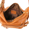 Internal Zipper Pocket View Of The Cognac Convertible Leather Handbag