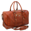 Angled And Shoulder Strap View Of The Honey Islander Leather Travel Bag