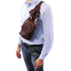 Man Wearing The Brown Leather Crossover Bag
