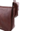 Close up Side Bag Feature Attachment View Of The Brown Leather Eyeglasses Case