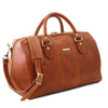 Angled View Of The Honey Leather Travel Bag Small