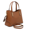 Angled And Shoulder Strap View Of The Cognac Genuine Leather Tote Handbag