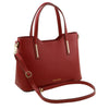 Angled And Shoulder Strap View Of The Red Genuine Leather Tote Handbag