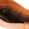 Internal Zip Pocket View Of The Cognac Convertible Bag