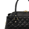 Close Of Leather Handles View Of The Black Quilted Leather Handbag