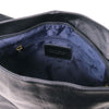 Internal Zip Pocket View Of The Black Tassel Crossbody Bag