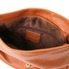 Internal Zip Pocket View Of The Cognac Tassel Crossbody Bag