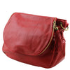 Angled View Of The Red Tassel Crossbody Bag
