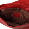 Internal Zip Pocket View Of The Red Tassel Crossbody Bag